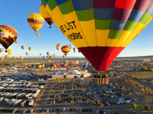 Rainbow Ryders flying over Albuquerque International Balloon Festival