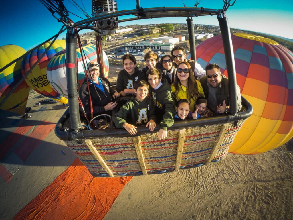 Passengers enjoying a hot air balloon flight